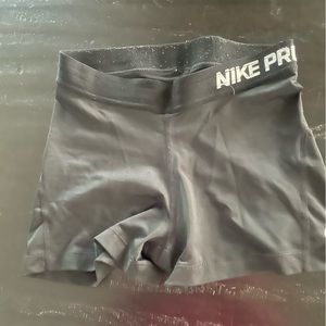 Black Nike compression shorts, small